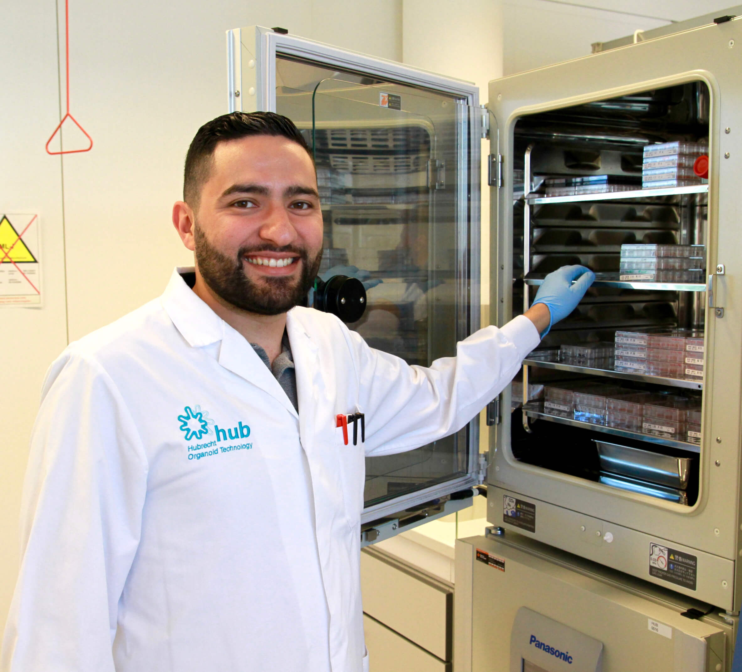 Lab assistant Ramazan Senlice next to one of HUB CO2 incubators