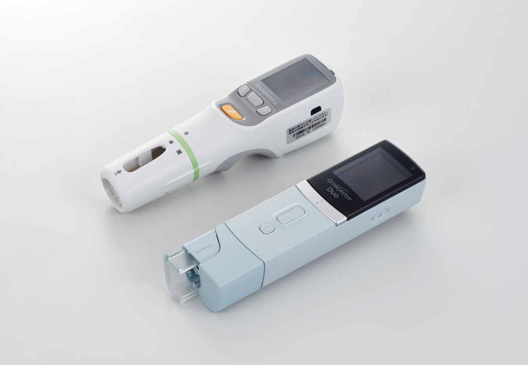 グロウジェクター<sup>&reg;</sup>Duo(手前)とグロウジェクター@Lにより治療選択肢を広げる