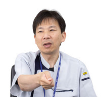 吉岡 利治